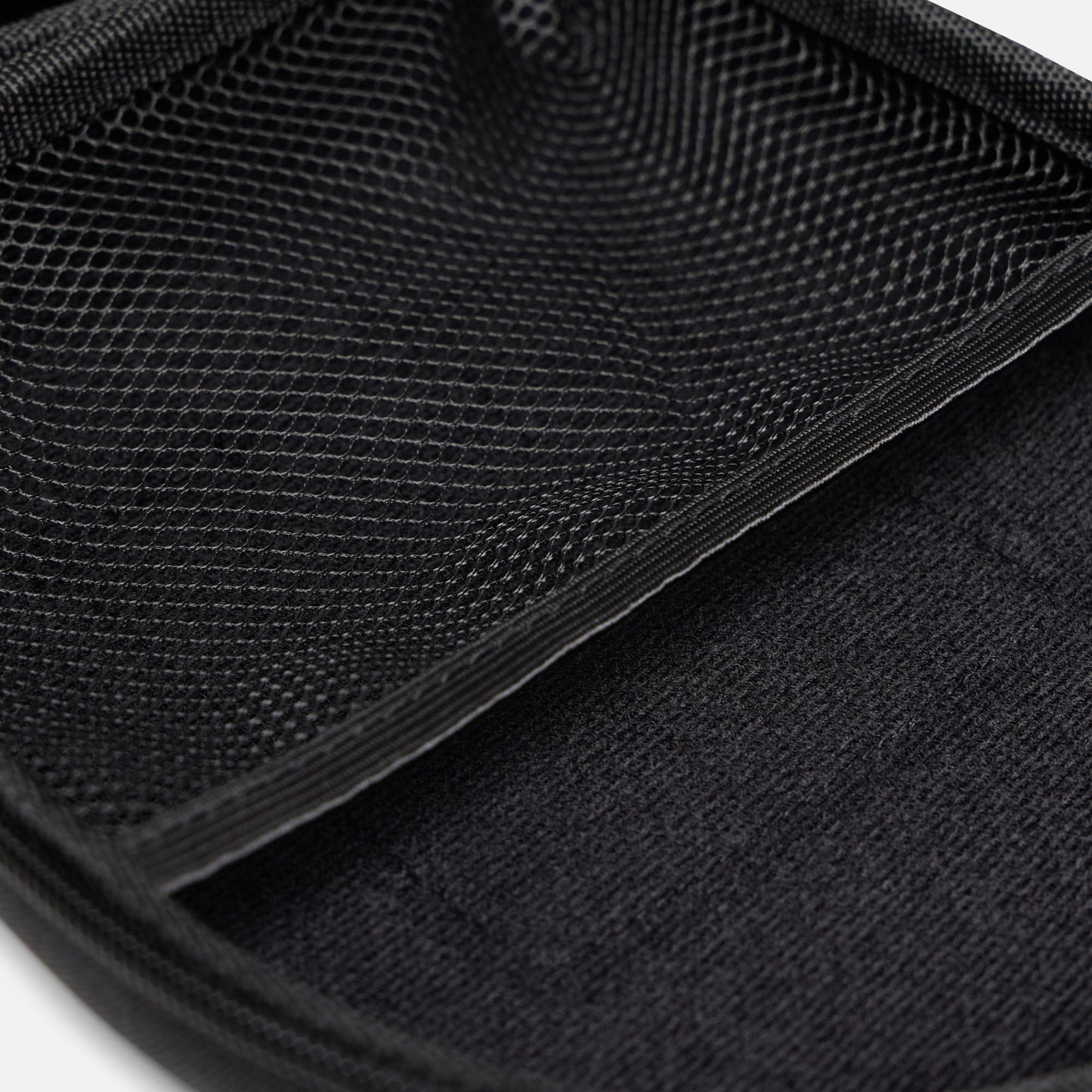 Internal mesh storage pocket inside ProtecWolf headphone case