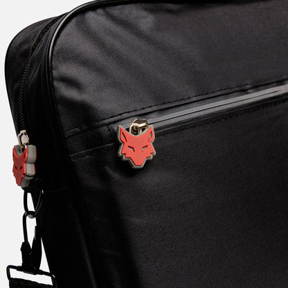 Black bag with a red and grey wolf emblem on a white background
