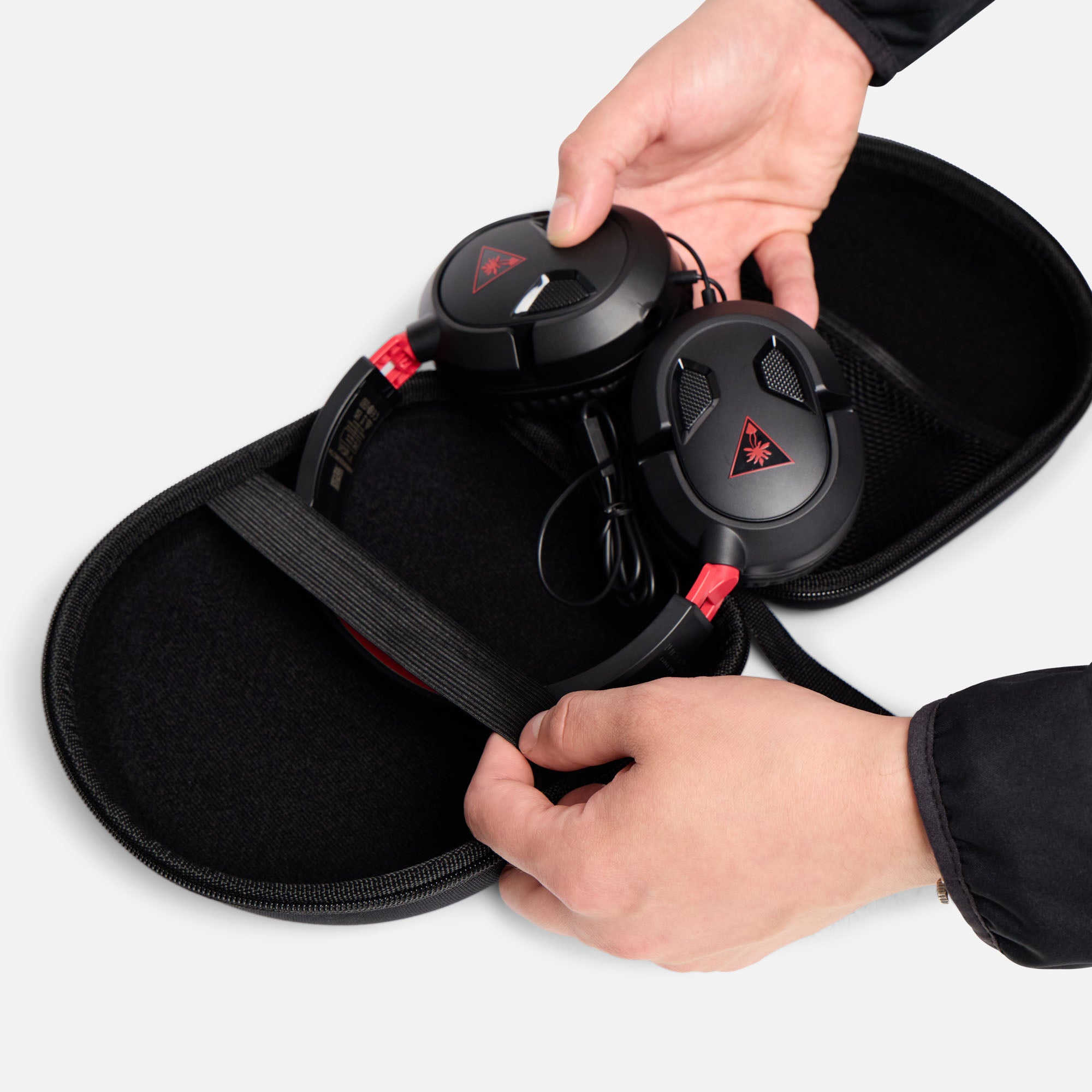 Placing headphones into ProtecWolf protective case