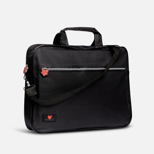 Black bag with a shoulder strap on a light gray background